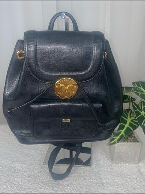 GUC Metrocity Vintage Signature Monogram Leather Backpack
